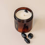 A soothing scent that brightens a room with coconut and vanilla. Made with a genuine Obsidian crystal nested inside the candle adds more meaning to your experience. Obsidian is known for blocking negativity to those who keep it.