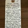 High Camp Albarino Orange handwritten tag on a wooden background