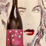 A bottle of Camins 2 Dreams Carbonic Carignan wine with a colorful label, held in front of a painted portrait of a woman with red lips.