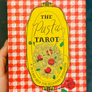 Pasta Tarot card deck packaging with red and white checkered pattern