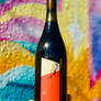 Wine bottle with a colorful abstract background