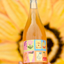 15% Orange Muscat 85% Gravenstein Organic Apples Lodi, California.  Woman winemaker - Cassidy Miller. All natural. Orange wine and cider co-ferment. This wine is down to clown, a flower field party for your mouth. Citrus medley and baked apple jamboree.