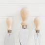 The perfect trio. Serve your cheese board in style. Made in Italy kitchen tools. Made of Beachwood and stainless steel, these little tools are built to last and add a touch of flair. Due to natural variations in wood grain and color, no two pieces are exactly alike and may differ slightly from the pictured product. A stylish way to slice and serve your favorite cheese. Woman Owned.