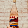 100% Gamay Columbia Valley, Washington. Woman winemaker - Kate Norris. All natural. Mountain minerals. If Strawberry Shortcake and the Jolly Green Giant had a love child. Volcanic saltiness. Bright and buzzy like an electric fruit neon sign. Touch of funk.