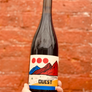 Sangiovese, Nebbiolo and Syrah red blend. Columbia Valley, Washington. Woman winemaker - Kate Norris. All natural. Chillable red. Sun kissed and bold. Bright, fresh and clean with just enough funk to make her interesting. Purple cherry pucker. Smoked porcini. Electric leather.