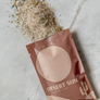 Desert Sun herbal bath soak packaging on a textured surface