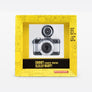 With a sleek black metallic design, the oh-so-adorable Fisheye Baby 110 Camera may be small, but it packs a 170-degree punch, shooting super-cool bulbous spheres on 110 film.
