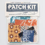 Bandana Patches to Mend Your Stuff! Kit Details *Comes in a resealable bag that is approximately 6" x 9" *Includes seven iron-on patches, backing fabric (for bigger holes) safety pins, needles and thread. *Suitable for ages six and up with adult supervision and help *Each kit will have a unique assortment of patch colors and patterns including 1xtra-large, 1 large, 1 medium, and 4 small patches. *Detail instructions included as well as a QR code link to more tutorials in video form. Woman Owned