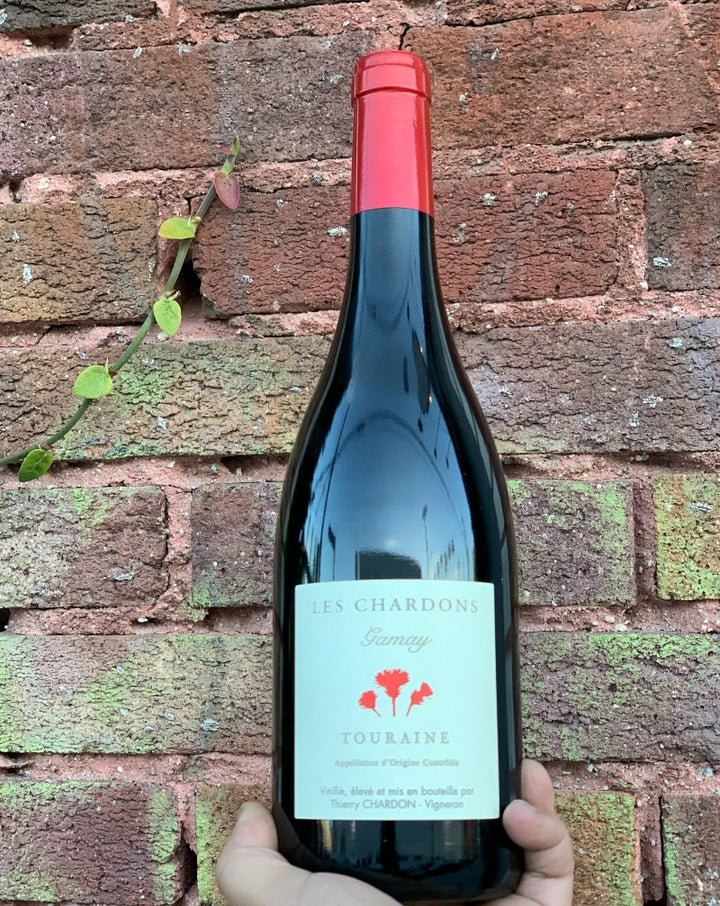 100% Gamay. Touraine, France.  Woman winemaker - Sophie Chardon. All natural. Chillable red. Like a rustic walk through a dusty ranch with strawberry tumble weeds rolling in a mineral breeze. Fresh cherries. Peppery + supple. Pinot Noir vibes.