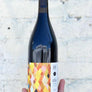 60% Nero d'Avola, 40% Zinfandel Mendocino, California.  Woman winemaker - Martha Stoumen. All natural. Dark cherries floating in black tea with wild herbs. Mood swings in a glass of fresh + delightful to deep + moody. Juicy kisses.