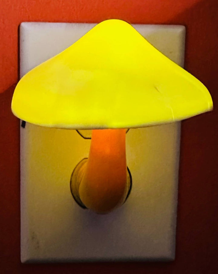 Super cute mushroom light! This nightlight plugs directly into any wall outlet. The mushroom light slowly cycles through different colors on its own. They give just enough light to keep from bumping into walls. The mushroom cap measures 3.25" in diameter & approx. 4.5" tall.
