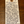 A handwritten wine tag on a wooden surface, featuring a printed header for Bernard Defaix 'Chablis' with detailed notes and a small price of 68.