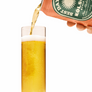 Kolsch beer being poured from a bottle into a glass with a visible brand label.