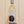 Wine bottle labeled 'cora' with a decorative label featuring a woman's silhouette against a beige background.
