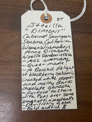 Handwritten label on a wooden surface