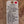 Tag with handwritten text on a wooden surface