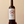 A bottle of Meritxell Palleja Nita Priorat red wine with a label featuring floral and fruit graphics.