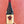 Wine bottle labeled 'Three Quarters' held against a red background