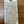 Handwritten wine label on a wooden surface