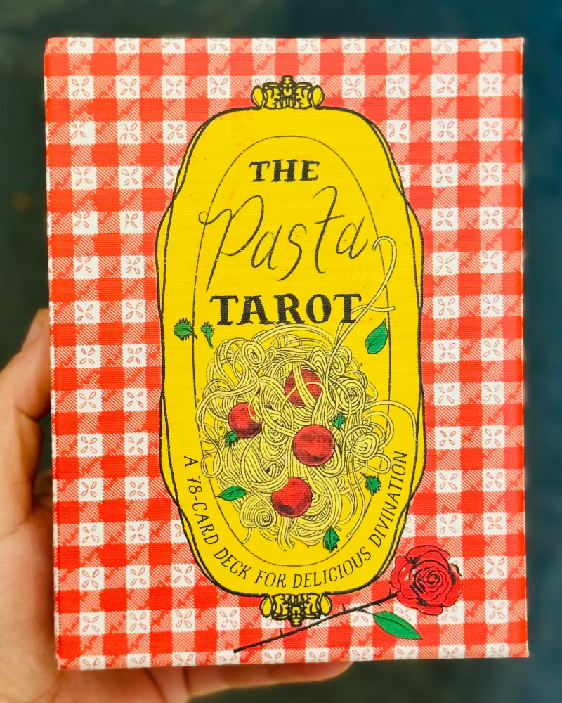 Pasta Tarot card deck packaging with red and white checkered pattern