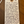 Wine label with handwritten notes on a wooden surface