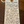 Handwritten wine label on a wooden surface