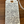 Handwritten wine label on a wooden surface