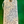Handwritten tag on a green background with product description