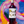 Bottle of Lestrille wine held against a colorful abstract background
