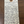 Handwritten wine label on a wooden surface