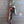 Metallic corkscrew on a wooden surface