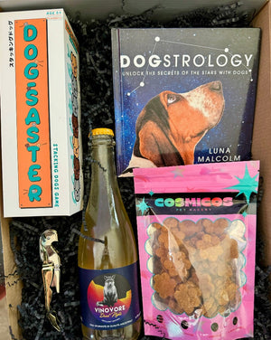 This box includes Vinovore Desert Nights Pēt-Nat half bottle, Dogstrology book, Dogsaster Stacking Game, one pack of Cosmicos Treats (must choose your flavor) and a corkscrew opener (must choose your color).