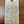 Handwritten wine label on a wooden surface