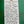 Handwritten label on a green background describing Shibata Brewery 'Pink' Cloudy Sake.