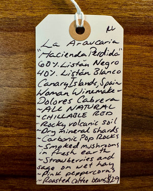 60% Listan Negro, 40% Listan Blanco
Canary Islands, Spain.

Woman winemaker - Dolores Cabrera Fernandez.
All natural.
Chillable red.
Rocky volcanic soil.
Dry mineral shreds.
Carbonic Pop Rocks.
Smoked mushrooms in fresh earth.
Strawberries and sage on wet hay.
Pink peppercorns.
Roasted coffee beans.