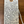 A handwritten gift tag on a wooden surface, reading 'Little Trouble "Gist Vineyard" 100% Syrah Sonoma, California Women Winemakers Jennifer Reichhardt Sara Morgenstern ~ All NATURAL ~ A brimming basket of boysen, marion and cosan berries ~ Salted Swedish licorice ~ Cali Rhone vibes ~ Russian Curant tea ~ Spicy black currants ~ Freshness suprise with rich pop !$'.