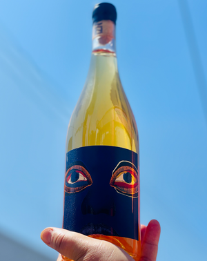 86% Chenin Blanc, 14% Viognier Swartland, South Africa.  Woman winemaker - Trizanne Barnard. Orange Wine. 1% for the planet + B Corp. Uniquely refreshing. Spiced chamomile tea. Tangerine zest. Apricot and honey. Album cover art of Indaba is, S. African Jazz band.