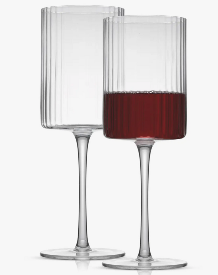 Ritzy bar glasses in a fluted origami style glass cup design. These are crafted with care in Czech Republic from premium quality, highly durable crystal. Dishwasher Safe.