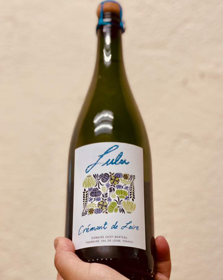 50% Cabernet Franc 25% Chardonnay 25% Chenin Blanc Loire, France.  Woman winemaker - Jacky Marteau. Creamy bubbles. Spicy and dry. Chamomile beeswax. Underripe yellow apple. Meyer lemon pith. White chocolate with prickly granite and yellow raspberries. Smooth tickles.