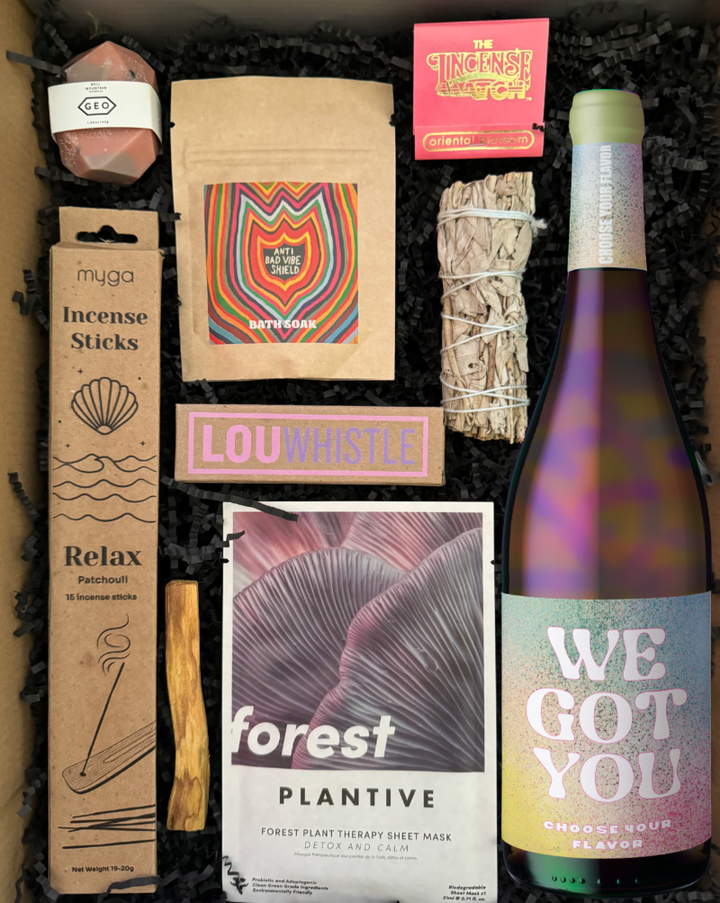 This box includes Bell Mountain Terrazzo Geo Mini Pink Soap, Oregon Bark Lou Whistle chocolate, Salt Soak Anti Bad Vibe Shield, White Sage Bundle, Incense Match (color/scent will vary), Palo Santo Smudge Stick, Myga Natural Incense Sticks (must choose scent), Plantive Plant Therapy Biodegradable Face Sheet Mask (must choose scent) and a bottle of wine. Please choose your flavor preference, and we'll select the perfect bottle to complement this box.