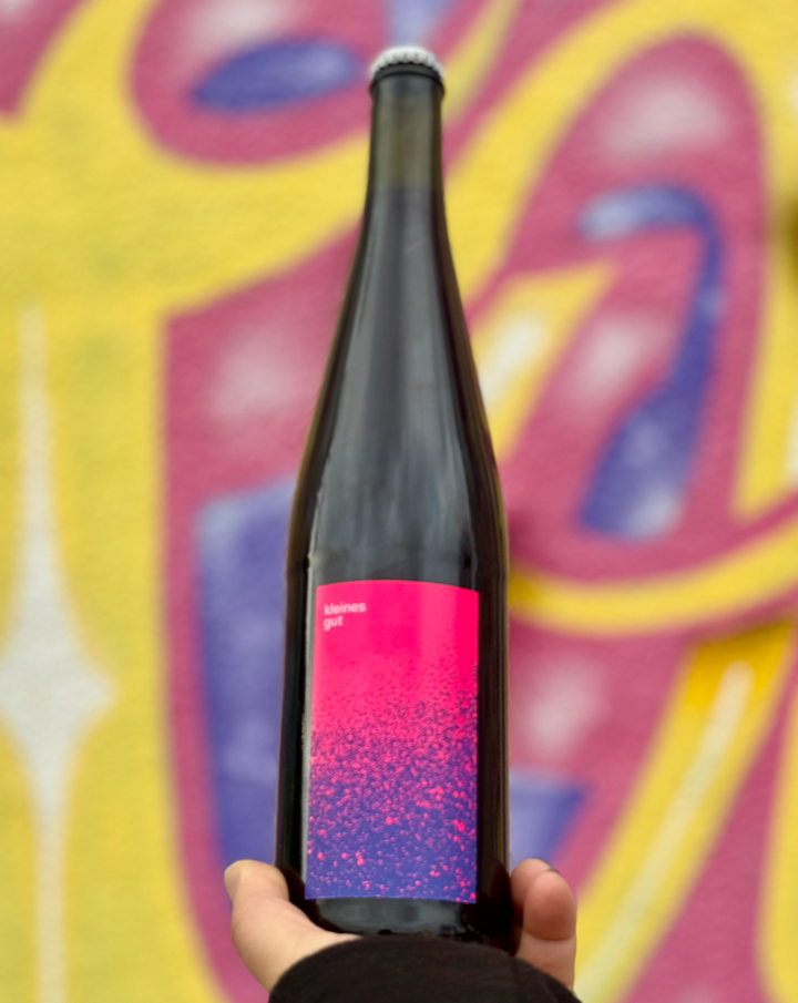 60% Trollinger, 30% Pinot Nior, 10% Zweigelt Württemberg, Germany.Woman winemaker - Frederike Schmidt.All natural.Chillable Red.Purple fizzy drink. Tart cherry juice.Cranberry ocean spray.Toasted herbs.Blood orange bubbles.A strawberry fairy kissing a red gummy bear in a forest.