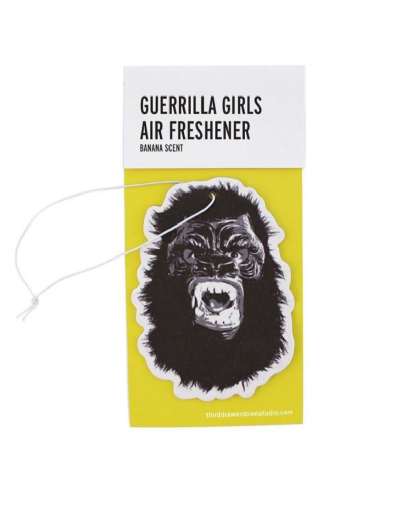 Third Drawer Down in collaboration with the Guerrilla Girls present the Eliminate the Stench of Patriarchy banana scented Air Freshener. Hang where stenches aren't wanted and feel empowered with a roaring combination of Banana and Art!