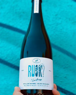 100% Chardonnay,&nbsp;
Willamette, Oregon.

Women winemakers - Melaney and Malia.
All natural.
Pét-Nat (bubbles).
White nectarine dreams on an anise lemon poofed pillow.
Green apple grip.
If you aren't OK... this wine will help!
Rustic richness and cool girl vibes.
Energetic bubbles.&nbsp;