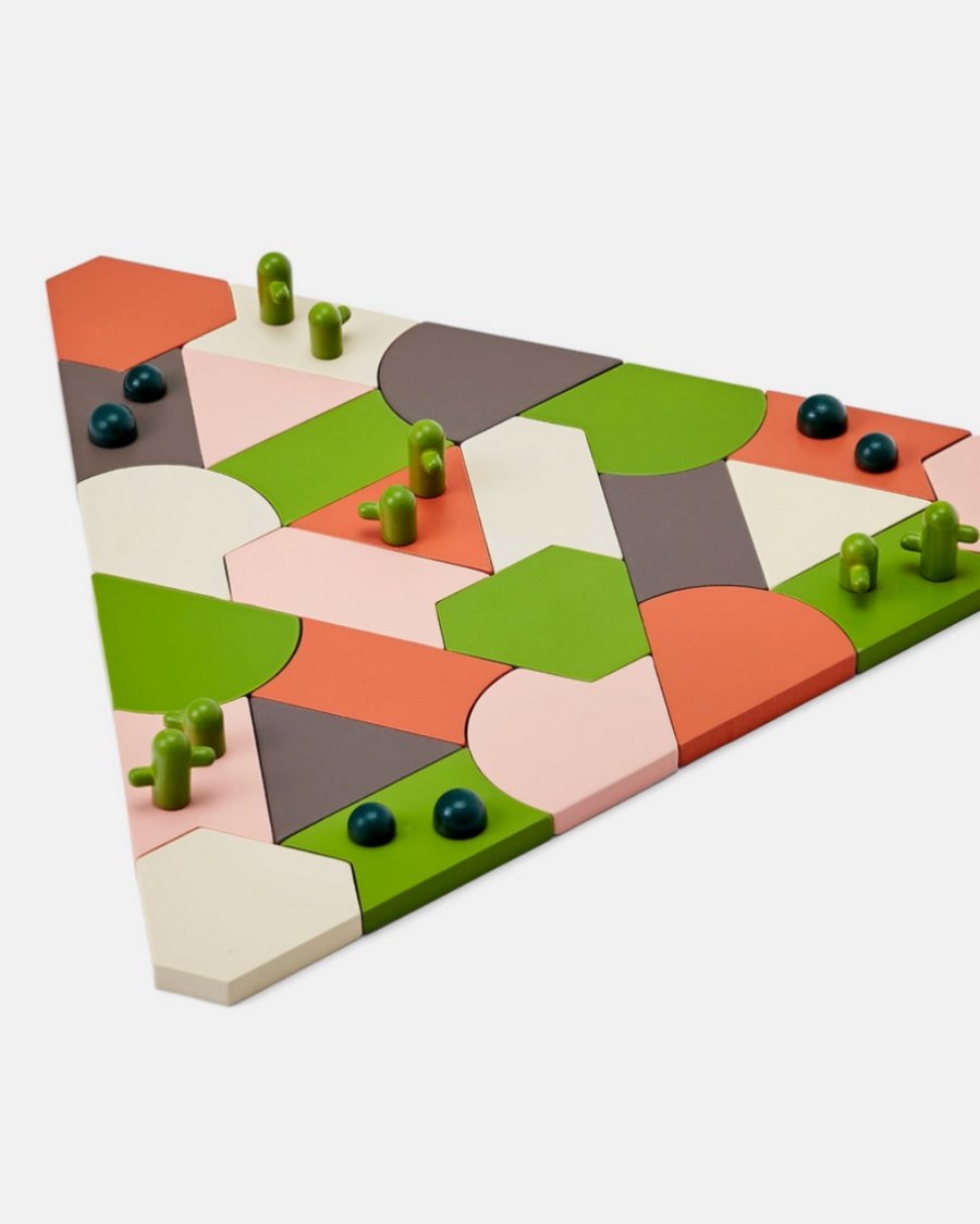 Colorful geometric board game with pieces on a white background