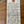 Handwritten wine label on a wooden surface