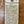 Handwritten wine label on a wooden surface