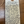 Handwritten wine label on a wooden surface