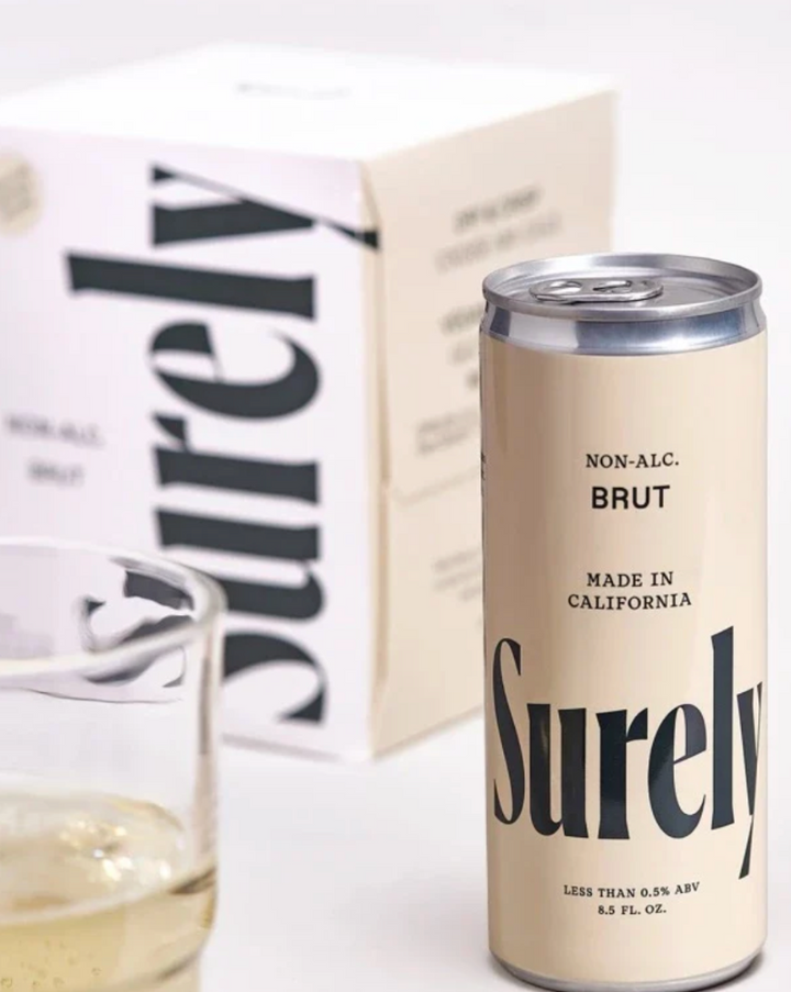 Proudly made in Wine Country, Surely Wines are on our shelves based on customer requests!&nbsp; These Sparkling Brut Cans consistently sell out...it's a&nbsp; bold but pleasant non-alcoholic Brut wine for any time of day. Not too dry, not too sweet. Hints of lemon, peach and passion fruit keep your tastebuds craving more.