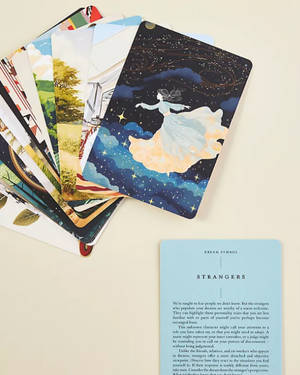 Collection of illustrated cards with a focus on one card featuring a woman in a dress against a starry night sky.