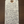 Handwritten wine label on a wooden surface